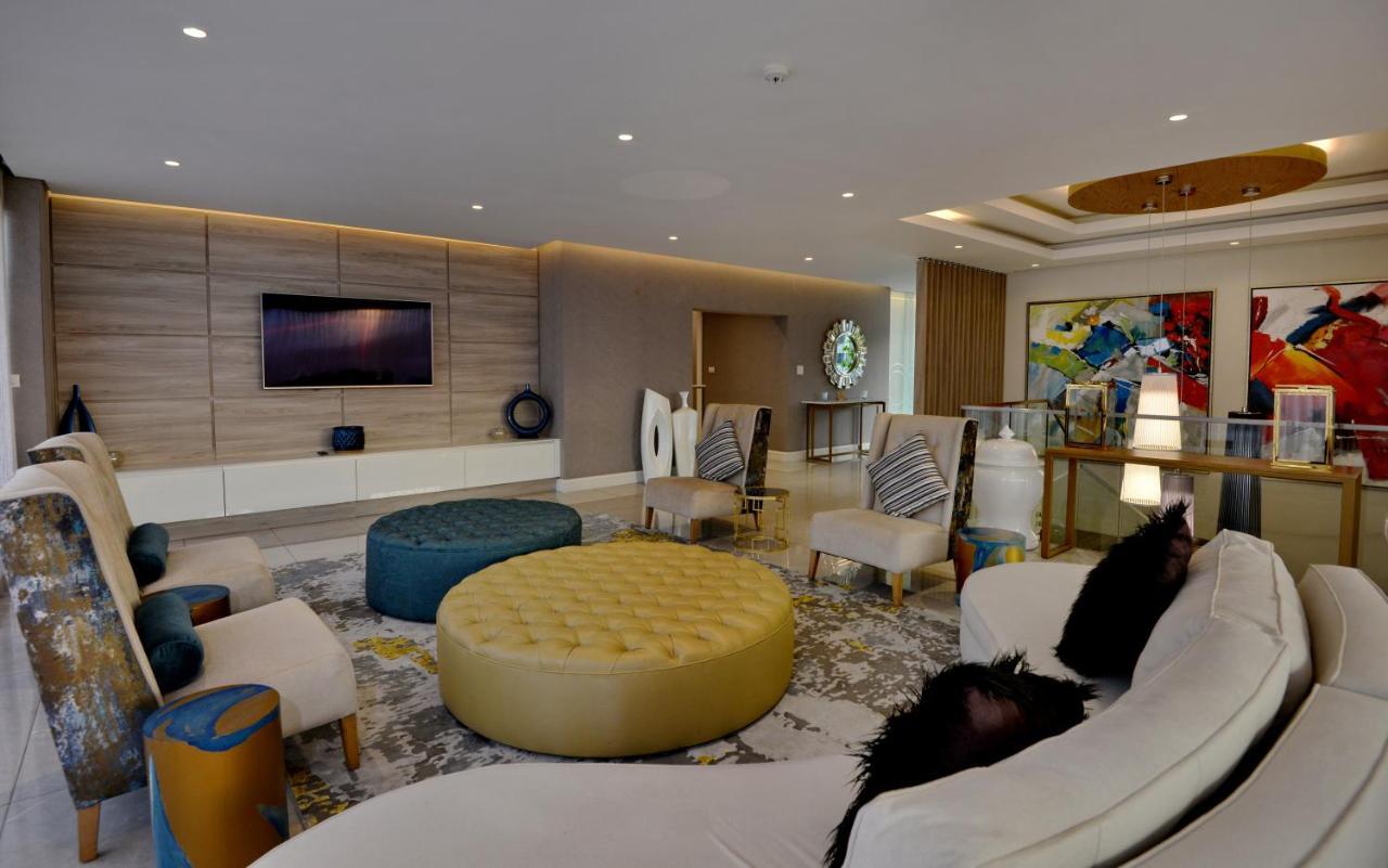 The Houghton Hotel, Spa, Wellness & Golf Johannesburgo Exterior foto A living room in a luxury apartment