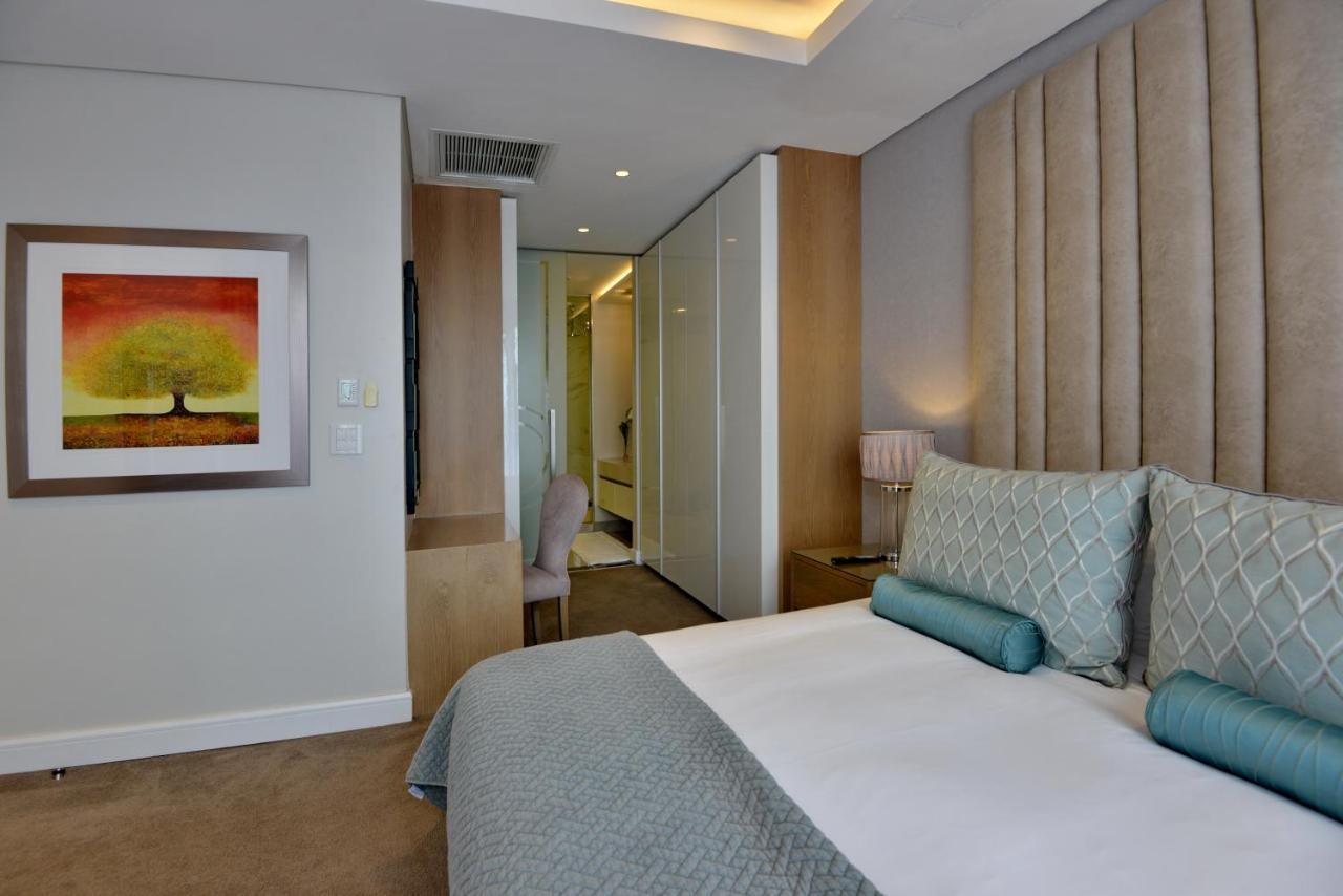 The Houghton Hotel, Spa, Wellness & Golf Johannesburgo Exterior foto A bedroom at the hotel