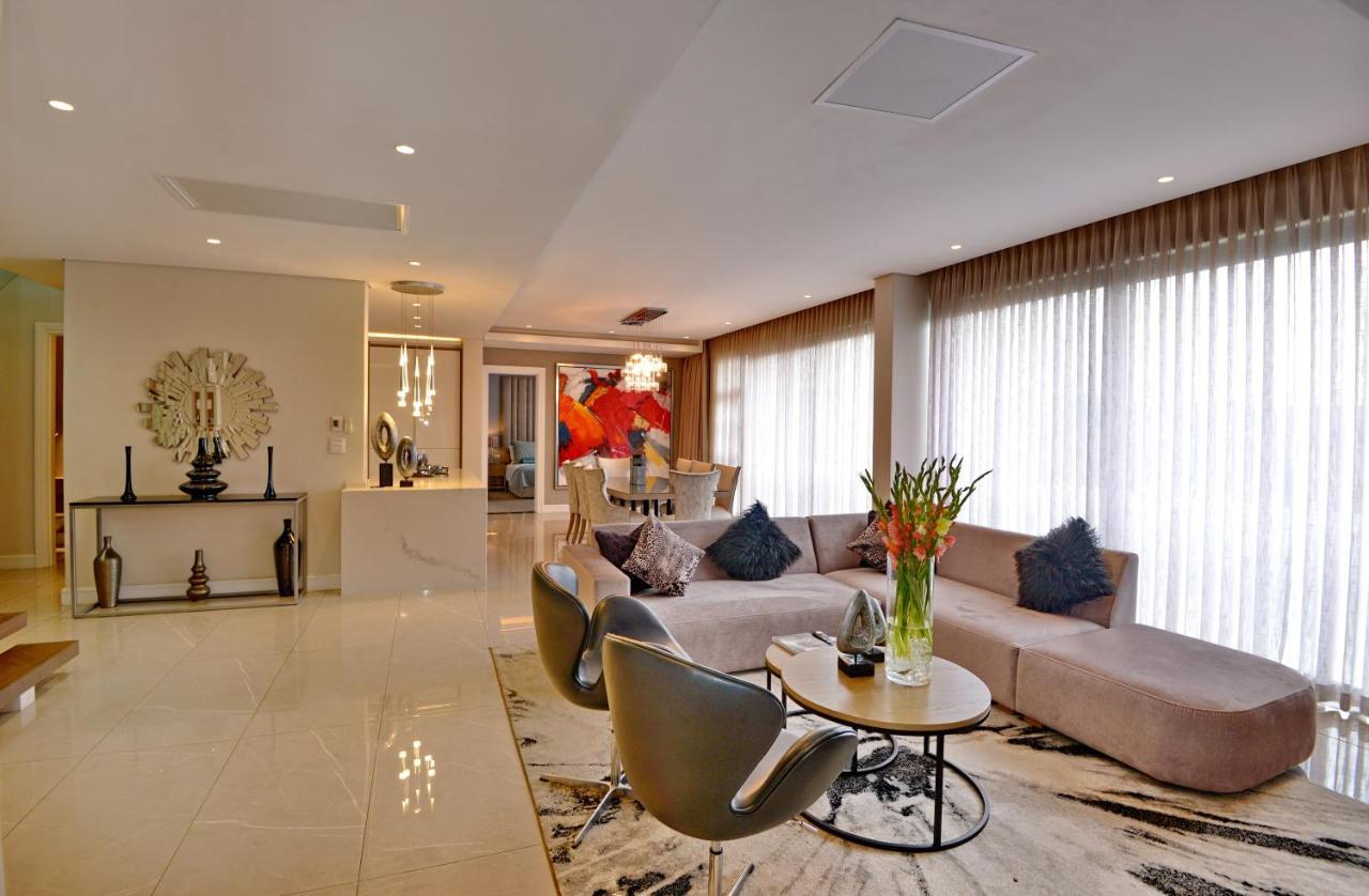 The Houghton Hotel, Spa, Wellness & Golf Johannesburgo Exterior foto A living room in a luxury apartment