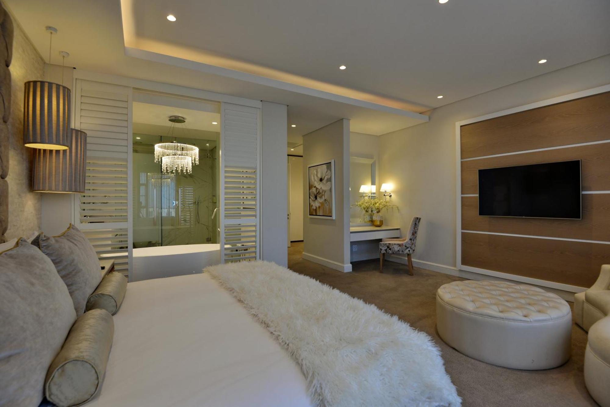 The Houghton Hotel, Spa, Wellness & Golf Johannesburgo Habitación foto A bedroom at The Ivy Hotel