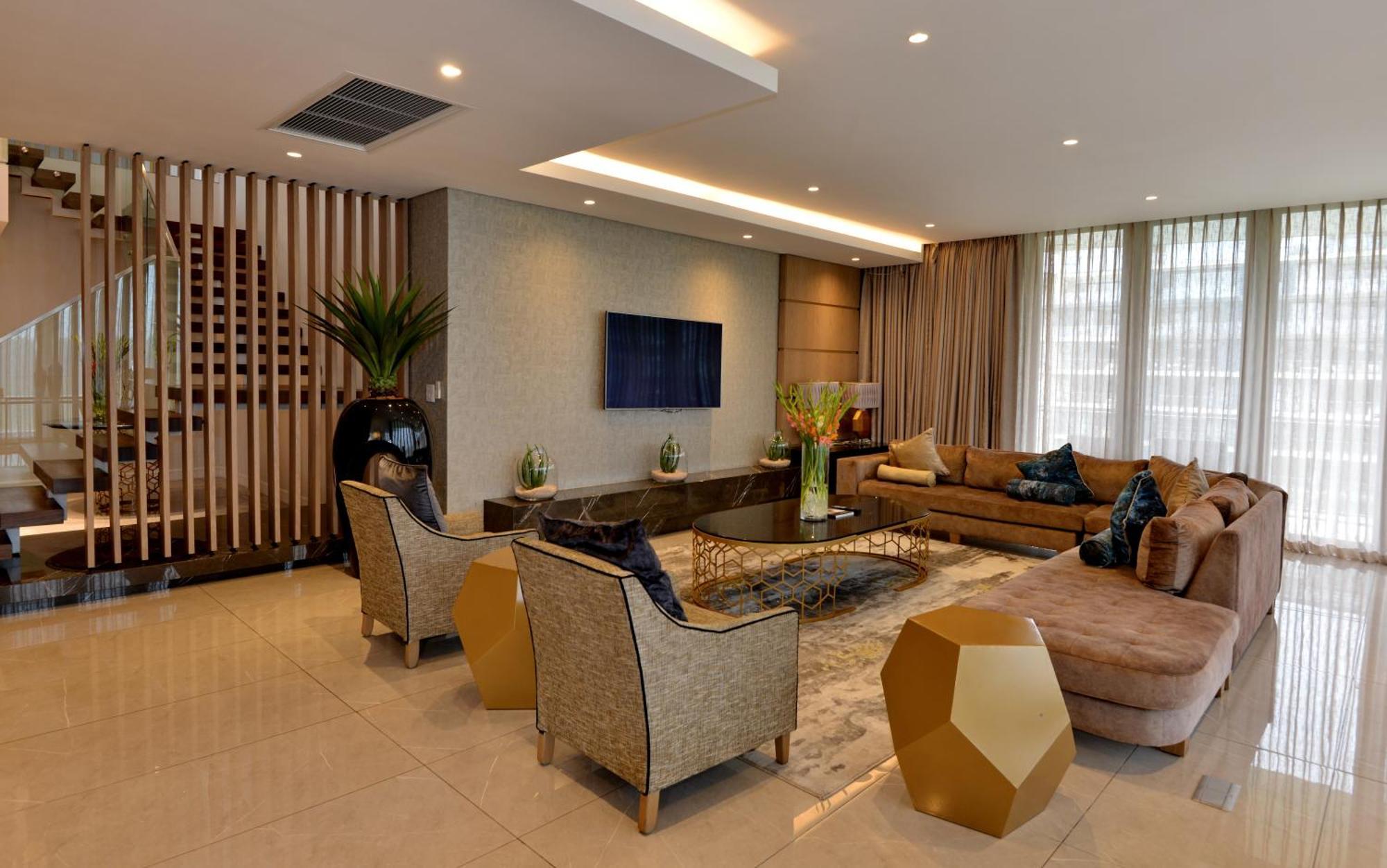 The Houghton Hotel, Spa, Wellness & Golf Johannesburgo Exterior foto A living room in a luxury apartment