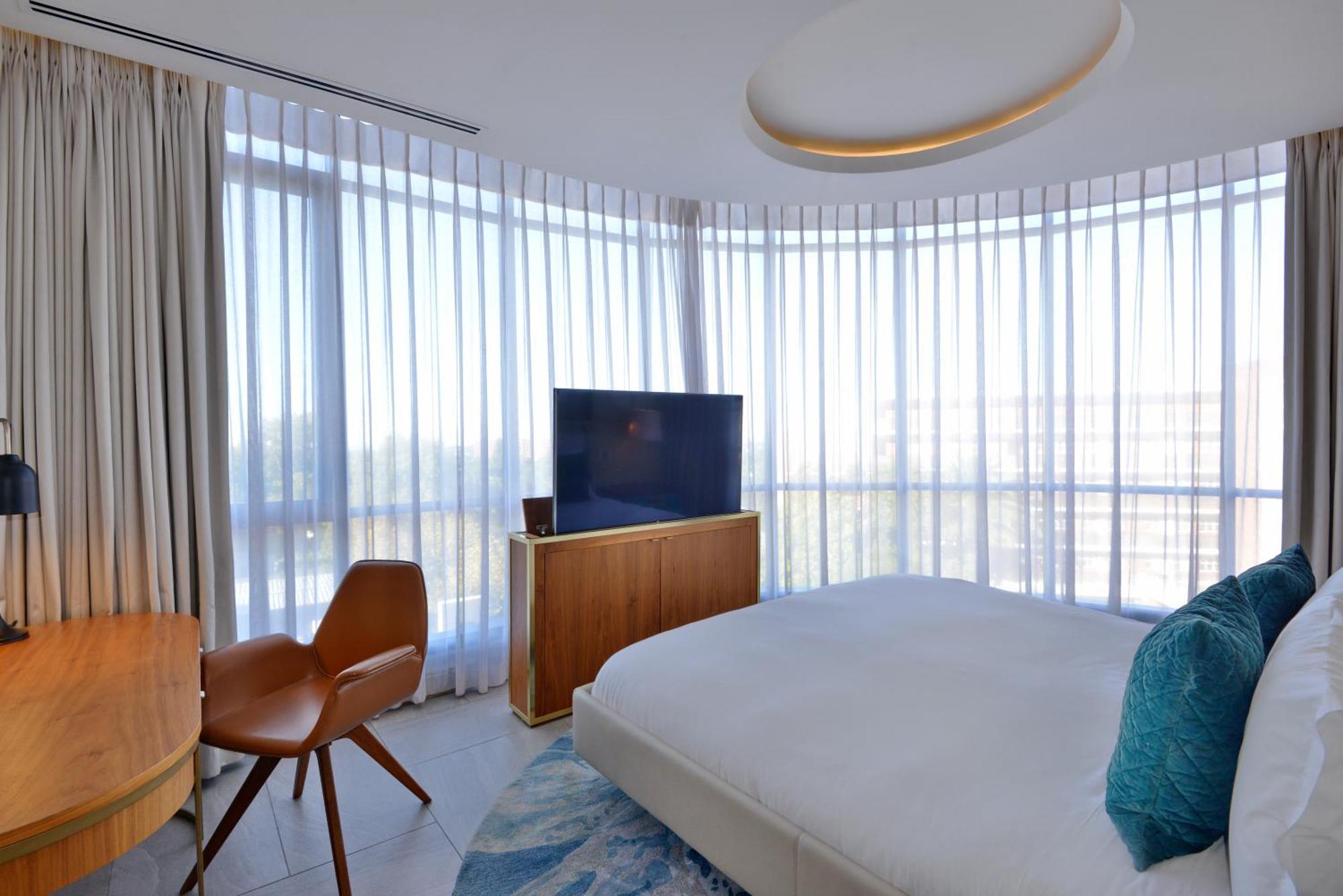 The Houghton Hotel, Spa, Wellness & Golf Johannesburgo Habitación foto A bedroom at the hotel